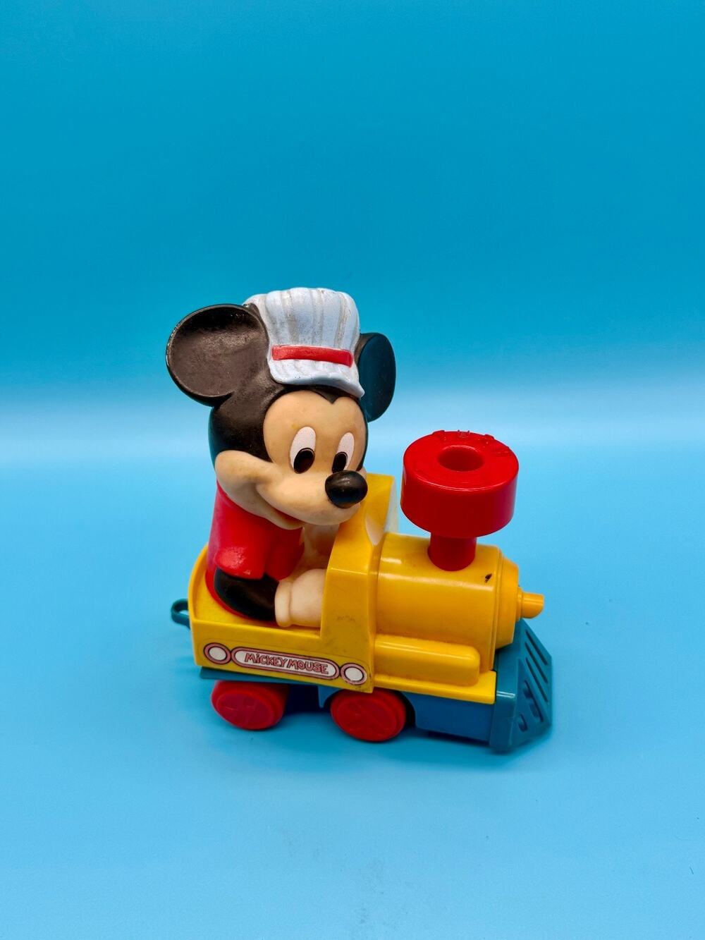 Vintage Walt Disney Mickey Mouse wind-up train engine made by Anillco Toy.